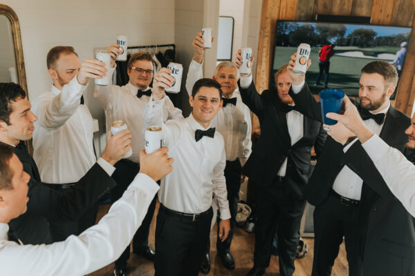 groom and his men toast to the big day