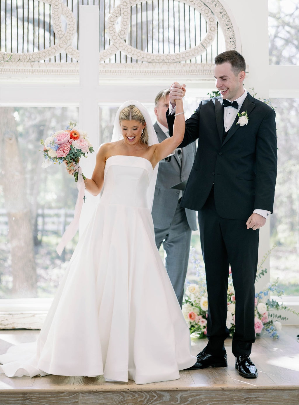 Jake spinning Janie as they are announced as Mr. and Mrs. Rehfuss at the altar