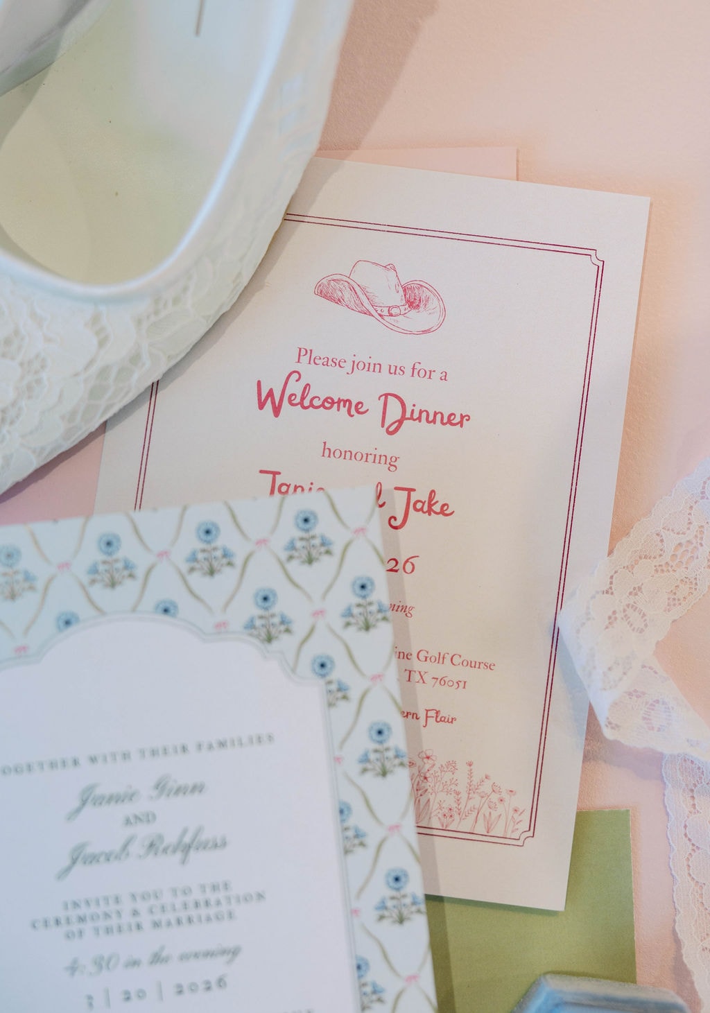 Janie and Jake wedding invitation suite and welcome dinner card flatlay