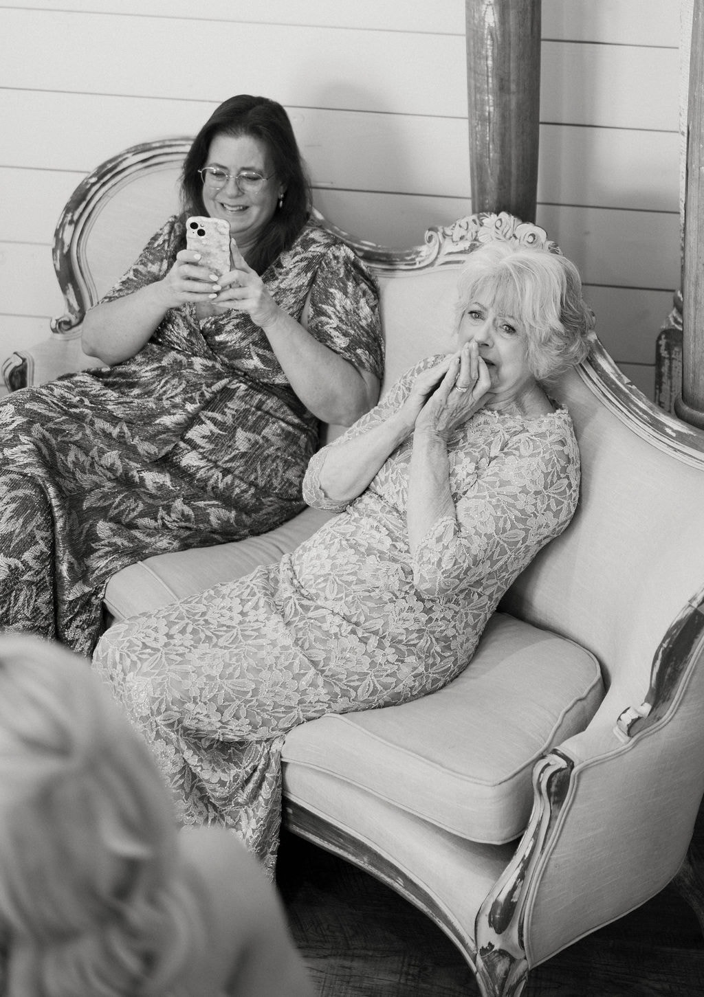 Grandmother's emotional reaction seeing Janie in her wedding dress, captured in black and white
