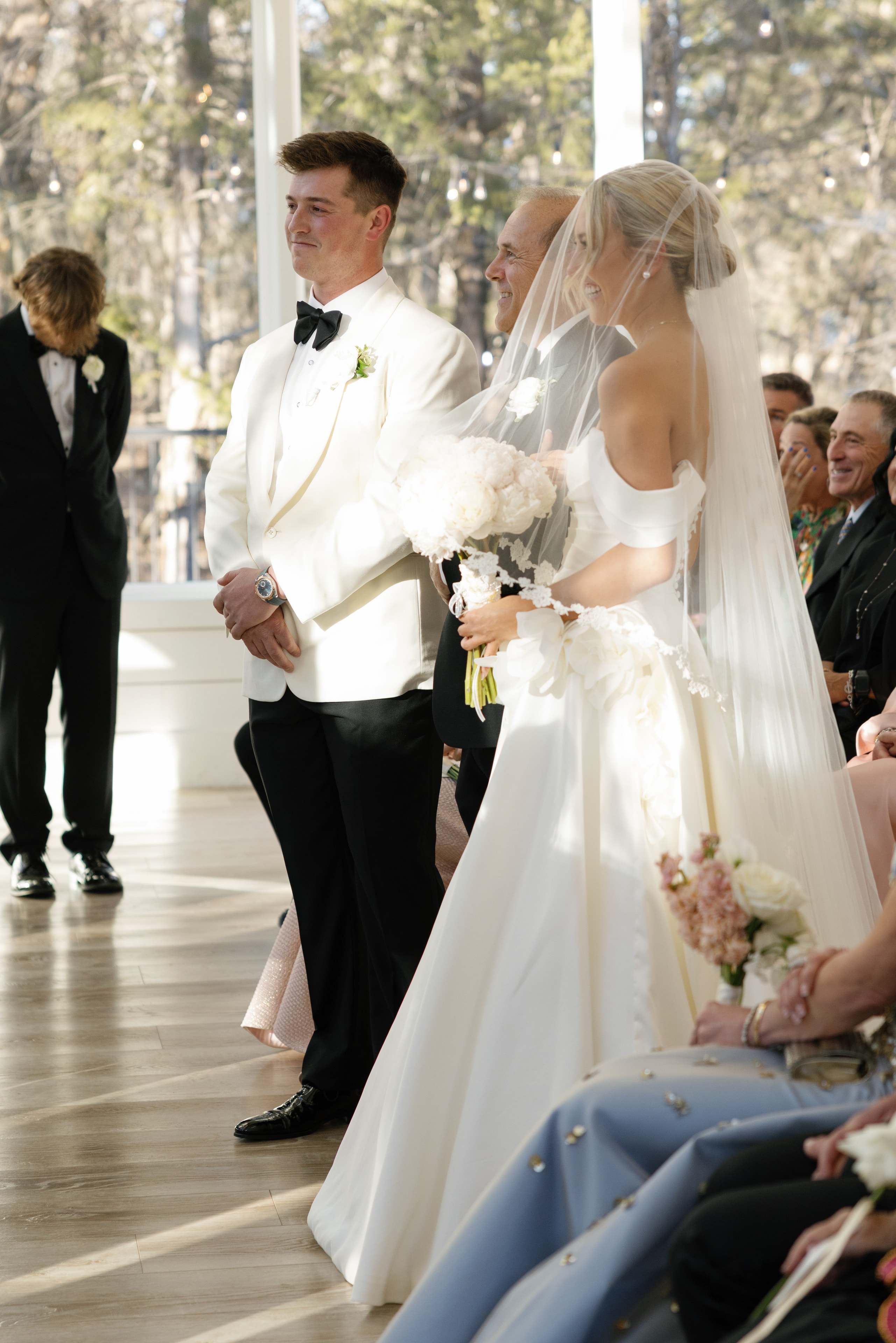 Rex seeing Megan for the first time at the altar with tears in his eyes at The French Farmhouse chapel