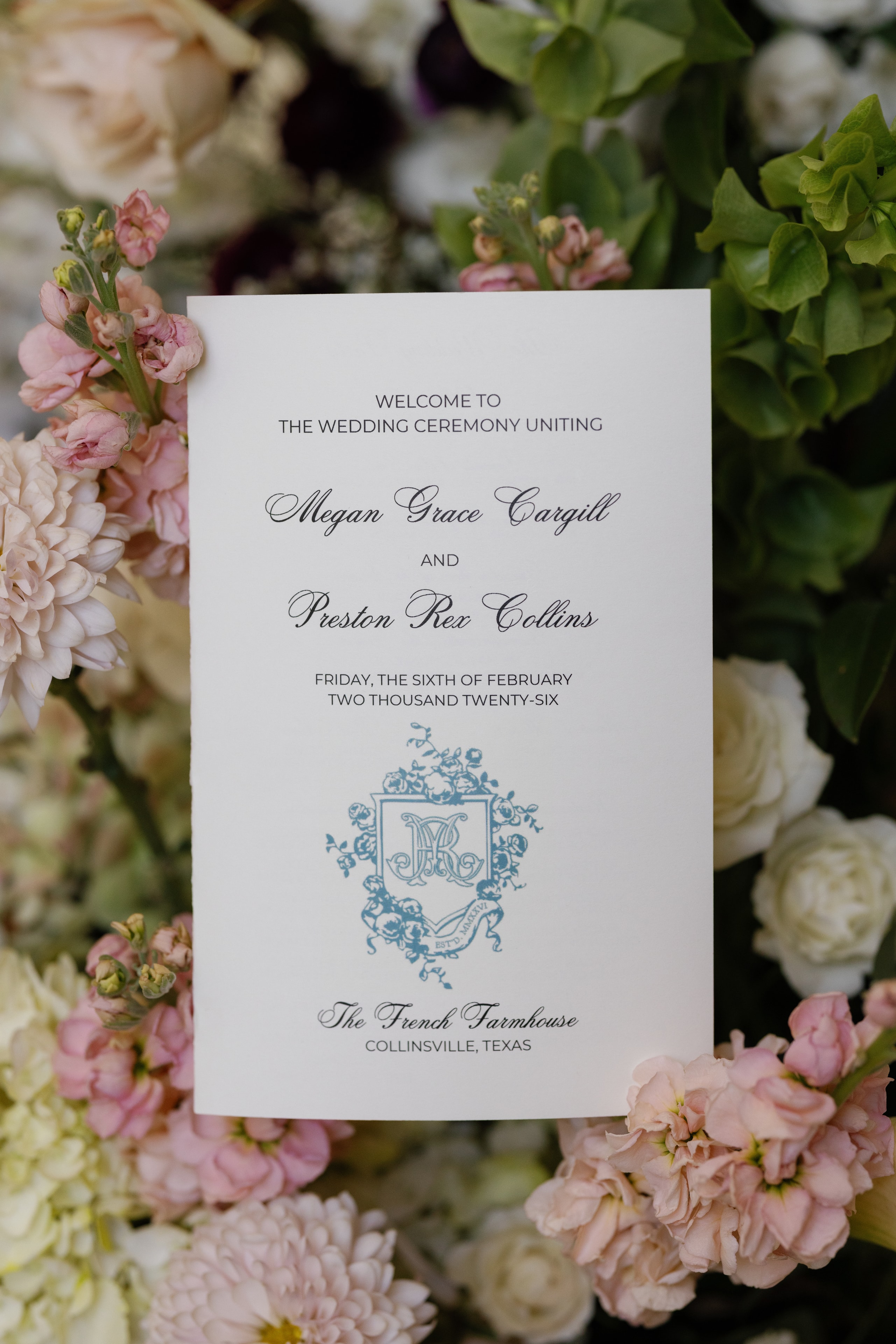 Megan Grace Cargill and Preston Rex Collins wedding ceremony program with floral crest