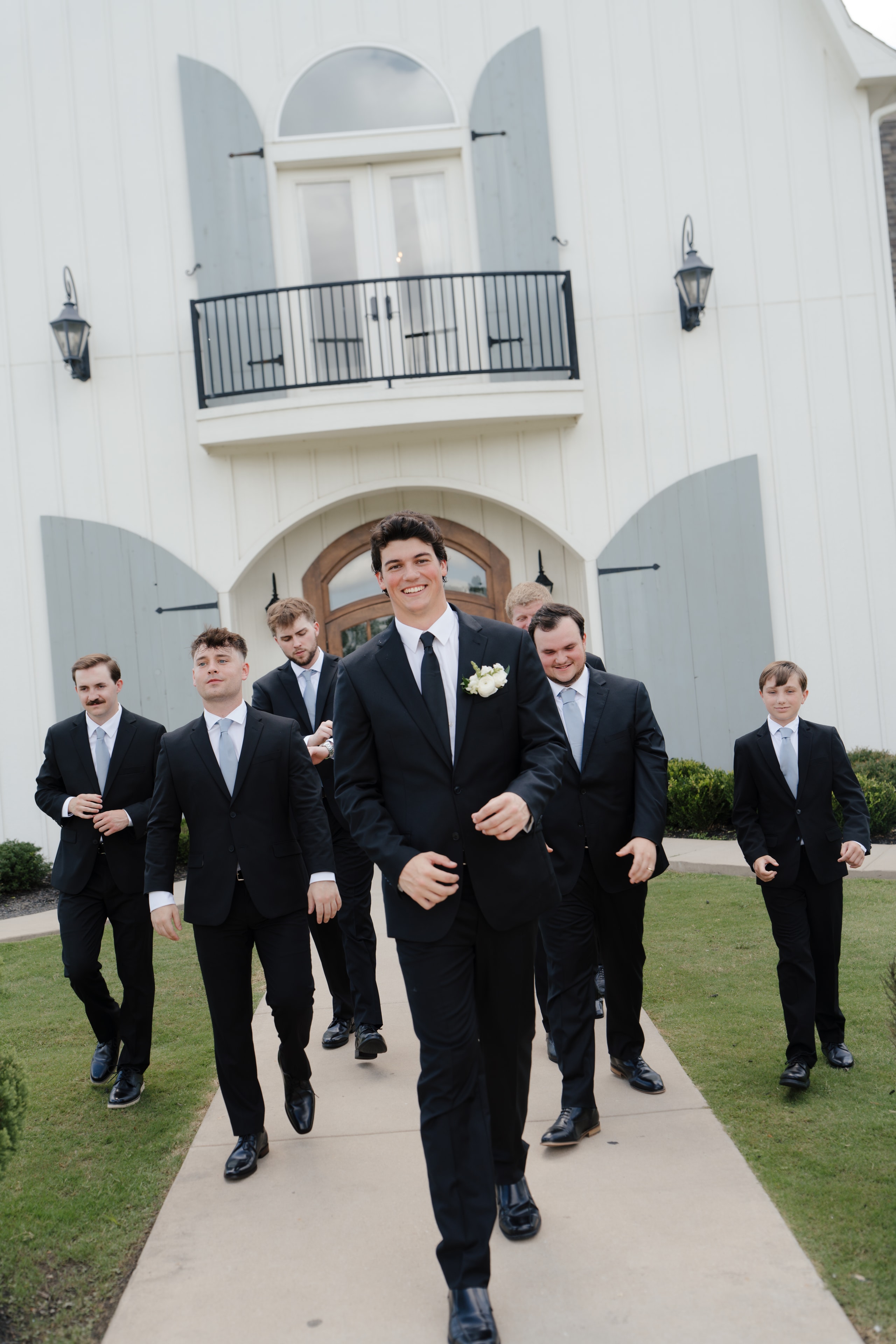 DJ and his groomsmen getting ready on the wedding morning at The French Farmhouse Venue