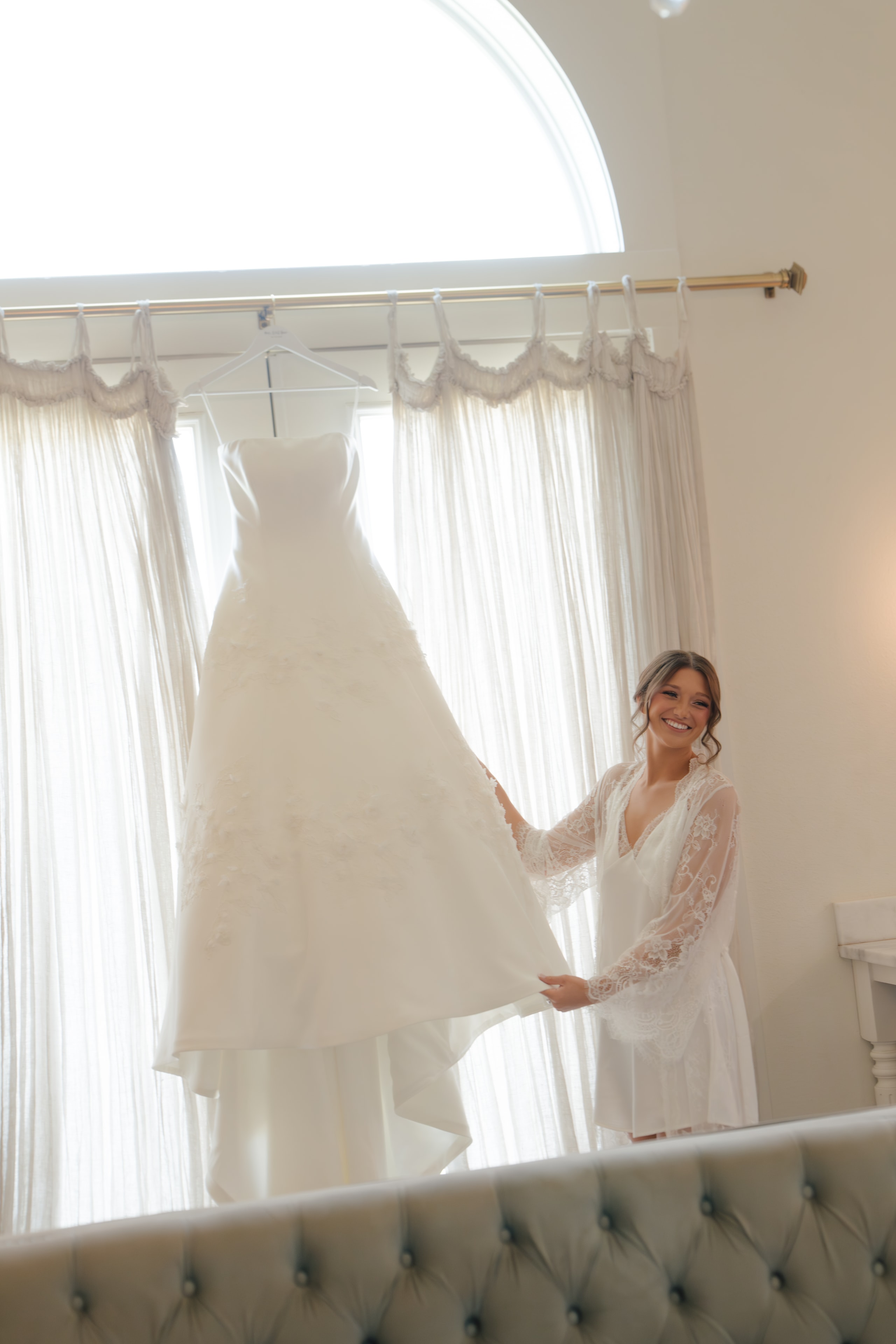 Paige getting ready on the morning of her wedding at The French Farmhouse Venue